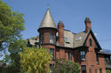 Back View Of Spired Mansion