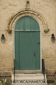 Green Front Door And Yellow Brick