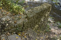 Old Stone Wall Below Waterfall