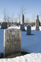 Tombstone With More Behind