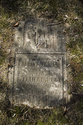 Tombstone Under The Grass