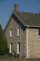 Back End With Windows And Stone Walls