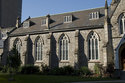 Side Of Church With Stained Glass Windows