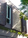 The Ranalli House upper windows detail