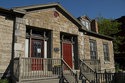 Front Angle View Of Stone House