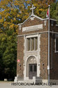 Old Brick School With Flag Pole