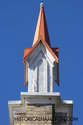 Painted Orange And White Church Spire
