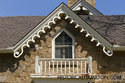 Peaked Roof With Window And Small Balcony