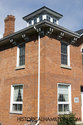 Corner Of The House With Windowed Tower