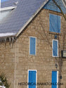 Stone Masonic Lodge With Blue Shutters