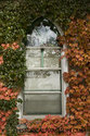 Fall Leaves Around The School Window