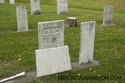 Broken Tombstone With Others