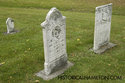 Tombstones In The Grass